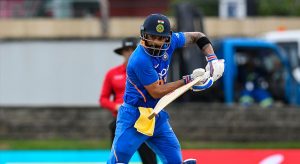 Kohli leads India to victory and overshadows Gayle swansong