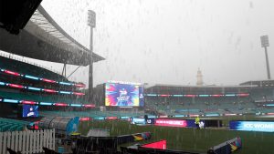 India progress as rain ruins first World Cup semi